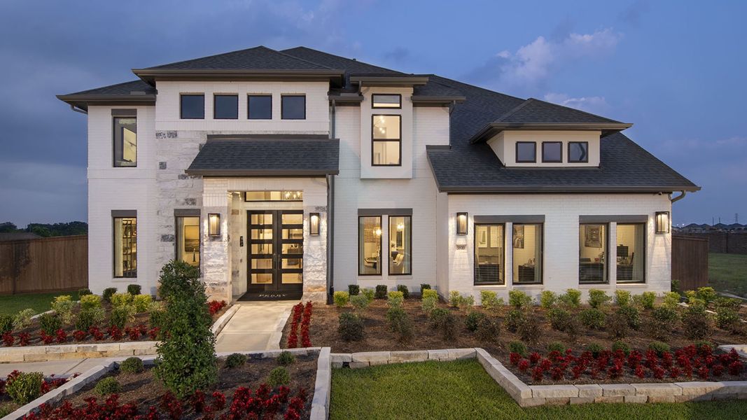 Front exterior of a new home in Legacy Prairie at Katy Court, Katy, TX, highlighting curb appeal (Image 1). Front exterior of a new home in Legacy Prairie at Katy Court, Katy, TX, highlighting curb appeal (Image 1).