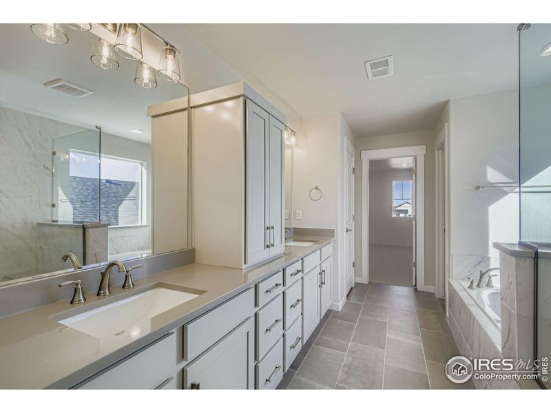 Furnished interior view inside a new home in RainDance National 60/70, Windsor (Image 12).