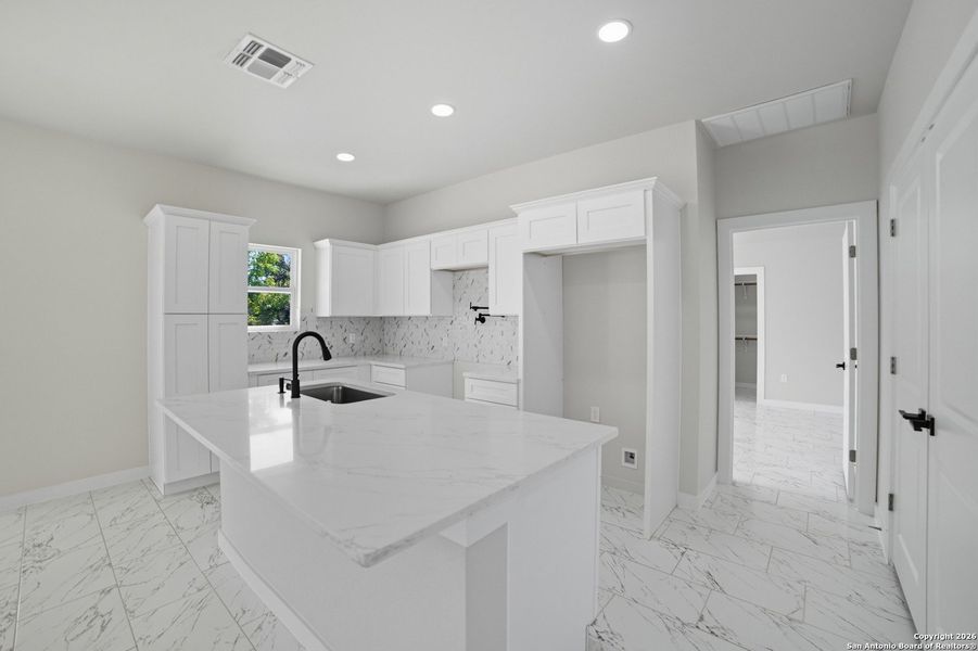 Furnished interior view inside a new home in , Atascosa (Image 6).