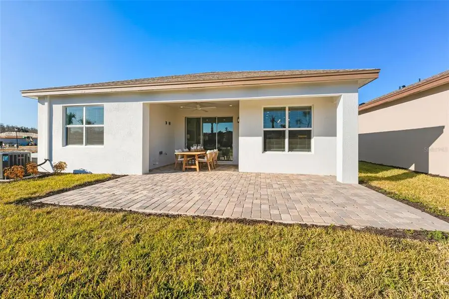Exterior details and patio area of a home in Valencia Ridge, Wesley Chapel (Image 3).