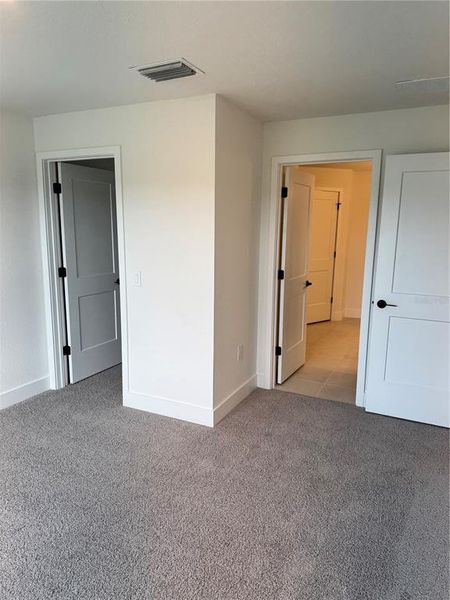 Spacious, unfurnished interior of a new home in Watercress Cove, North Port (Image 10). Spacious, unfurnished interior of a new home in Watercress Cove, North Port (Image 10).