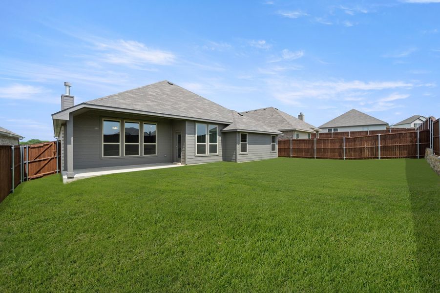 Front exterior of a new home in Still Water Lake Estates, Godley, TX, highlighting curb appeal (Image 26).