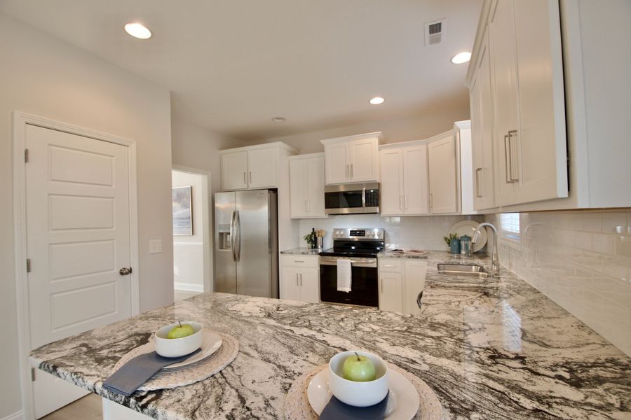 Furnished interior view inside a new home in Showcase Homes Burgaw & St. Helena, Burgaw (Image 8).