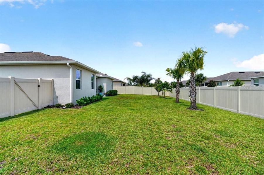 Exterior details and patio area of a home in Archers Mill, Ormond Beach (Image 30).