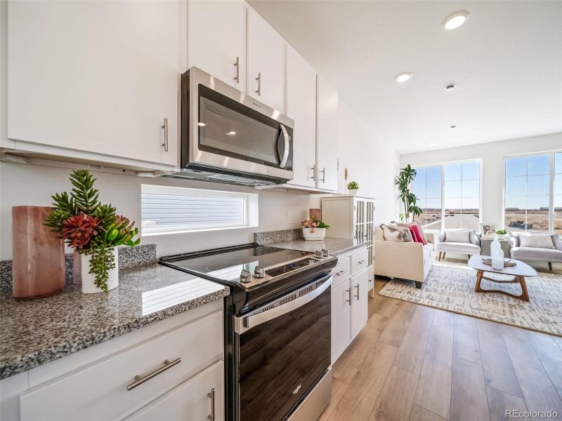 Furnished interior view inside a new home in Thompson River Ranch, Johnstown (Image 6).
