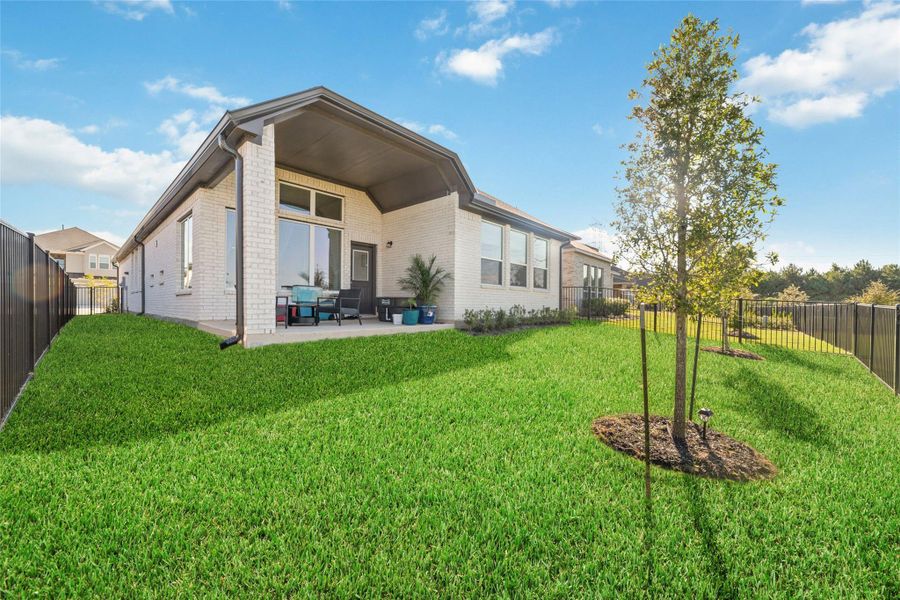 Exterior details and patio area of a home in Bridgeland 45's, Cypress (Image 3).