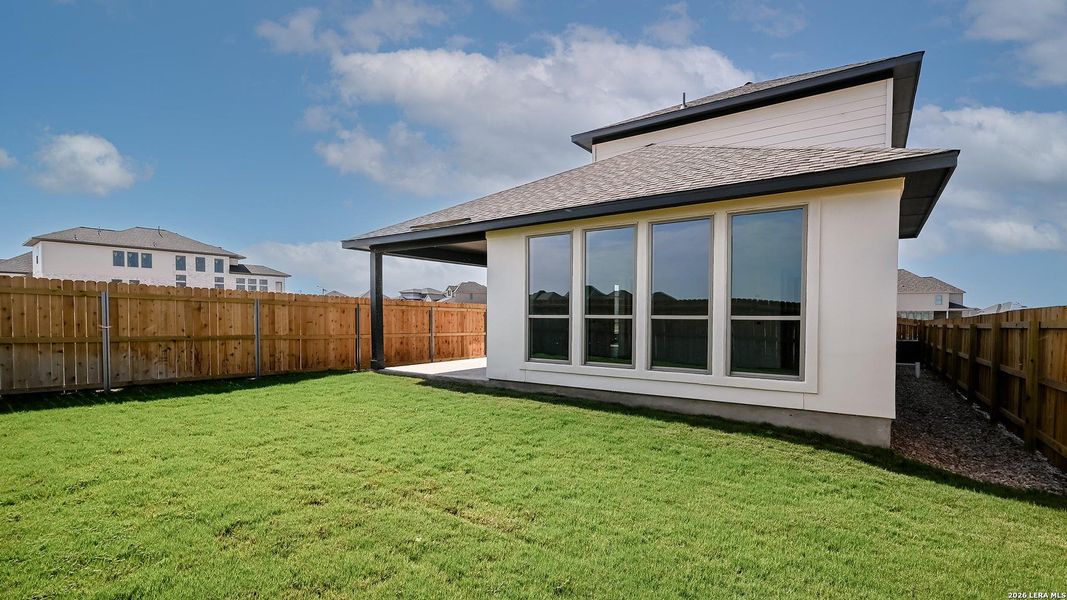 Exterior details and patio area of a home in Legacy at Lake Dunlap, New Braunfels (Image 3).