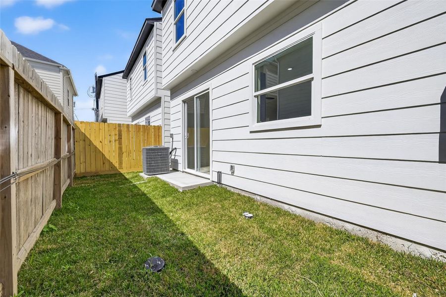 Exterior details and patio area of a home in , Houston (Image 3). Exterior details and patio area of a home in , Houston (Image 3).