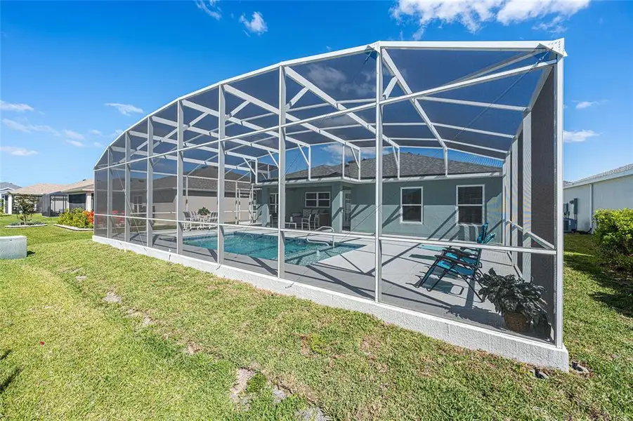 Exterior details and patio area of a home in , The Villages (Image 35).