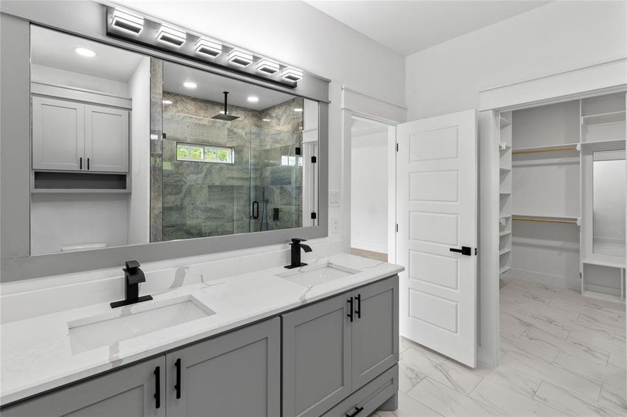 Bathroom with vanity and walk in shower