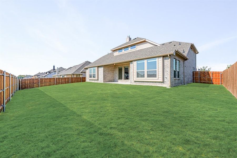 Front exterior of a new home in Ridgepoint, Midlothian, TX, highlighting curb appeal (Image 1).