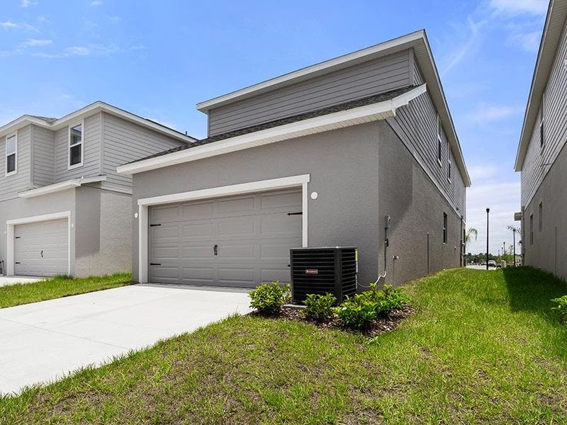 The Donatella bungalow includes an attached 2-car garage, located at the rear of the home.