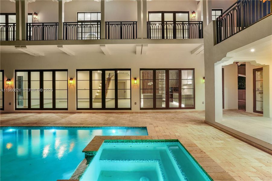 Exterior details and patio area of a home in , Coral Gables (Image 20).