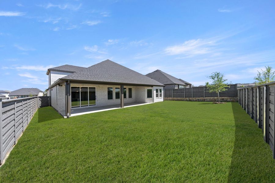 Exterior details and patio area of a home in Union Park, Little Elm (Image 3). Exterior details and patio area of a home in Union Park, Little Elm (Image 3).