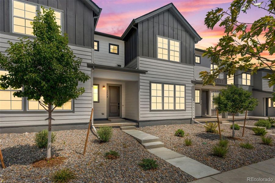 Front exterior of a new home in , Berthoud, CO, highlighting curb appeal (Image 24).