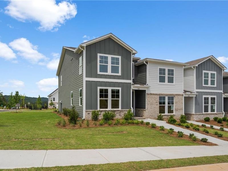 Front exterior of a new home in Stegall Village, Cartersville, GA, highlighting curb appeal (Image 2). Front exterior of a new home in Stegall Village, Cartersville, GA, highlighting curb appeal (Image 2).