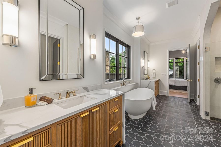 Dual vanities and soaking tub