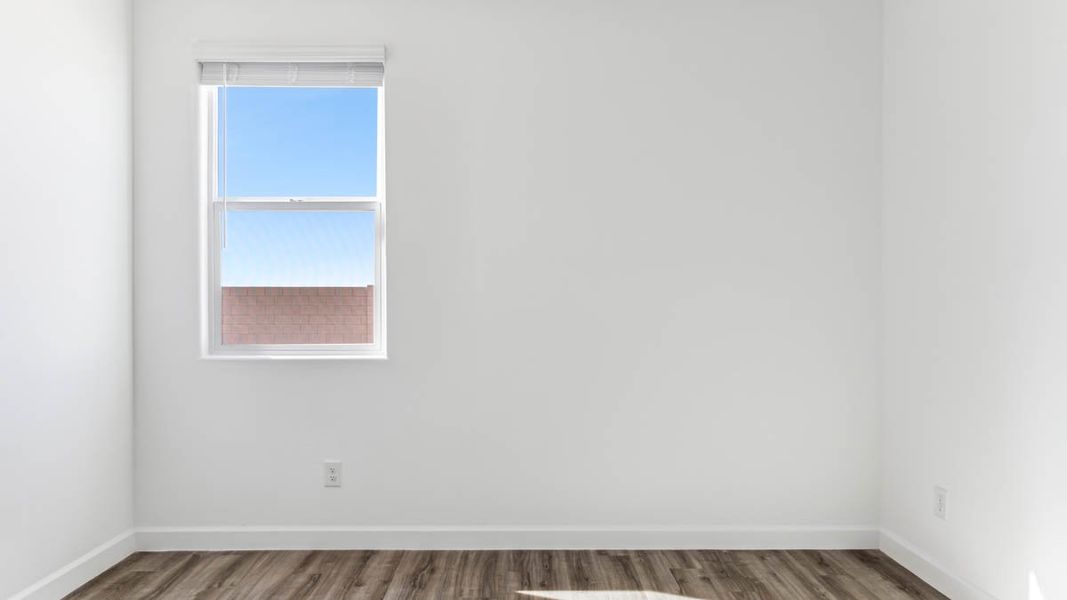 Spacious, unfurnished interior of a new home in Quail Ranch, San Tan Valley (Image 22).