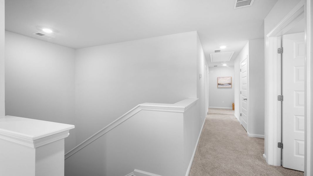 Representative unfurnished interior of a home built from the Hartsville by D.R. Horton in Rice Hope, Port Wentworth (Image 19).