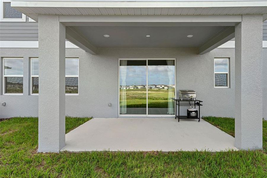 Exterior details and patio area of a home in Wellness Ridge, Clermont (Image 31).