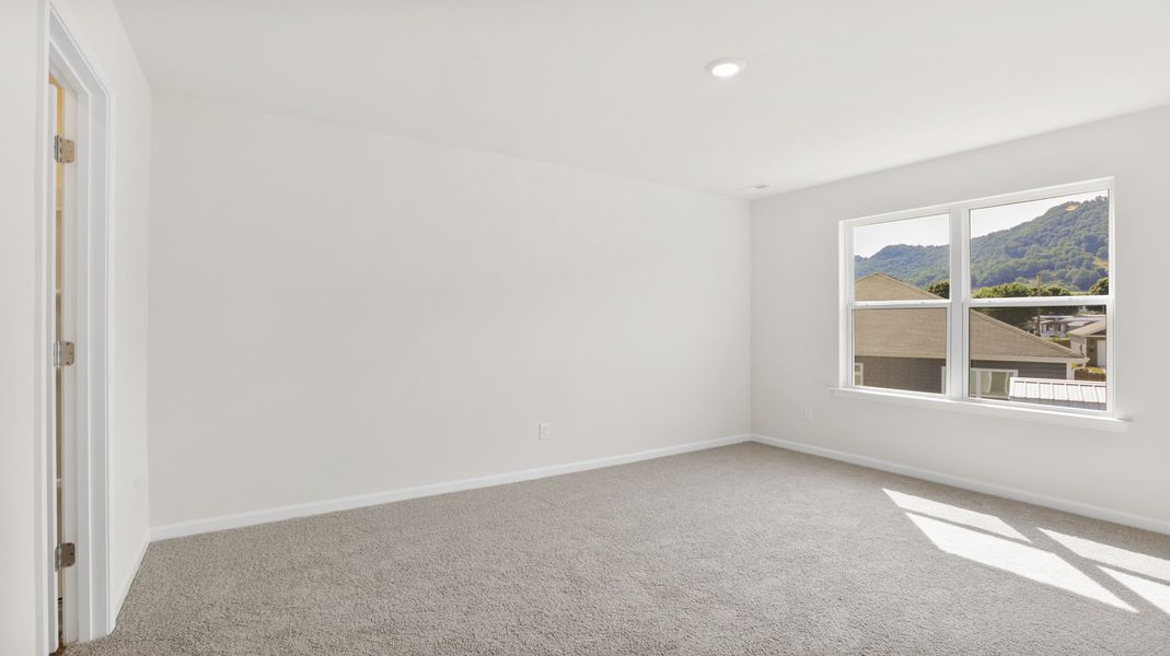 Spacious, unfurnished interior of a new home in Wildbrook Village, Waynesville (Image 25).