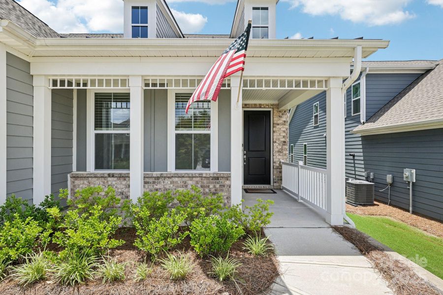 Front exterior of a new home in Handsmill on Lake Wylie, York, SC, highlighting curb appeal (Image 2).