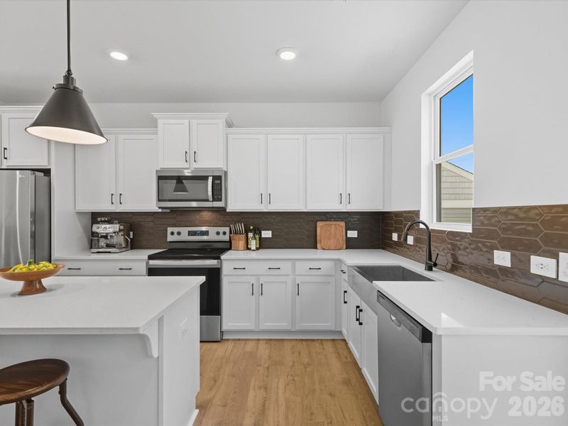 Furnished interior view inside a new home in The Landings at Catawba River, Charlotte (Image 33).