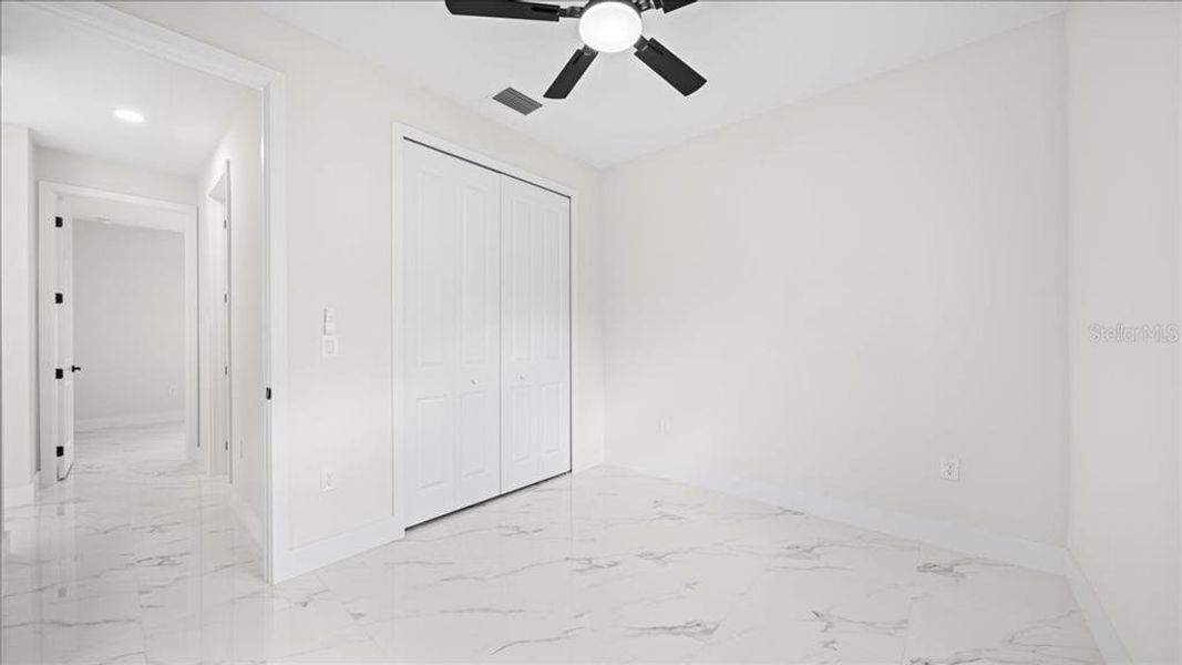 Spacious, unfurnished interior of a new home in , Port Charlotte (Image 25).