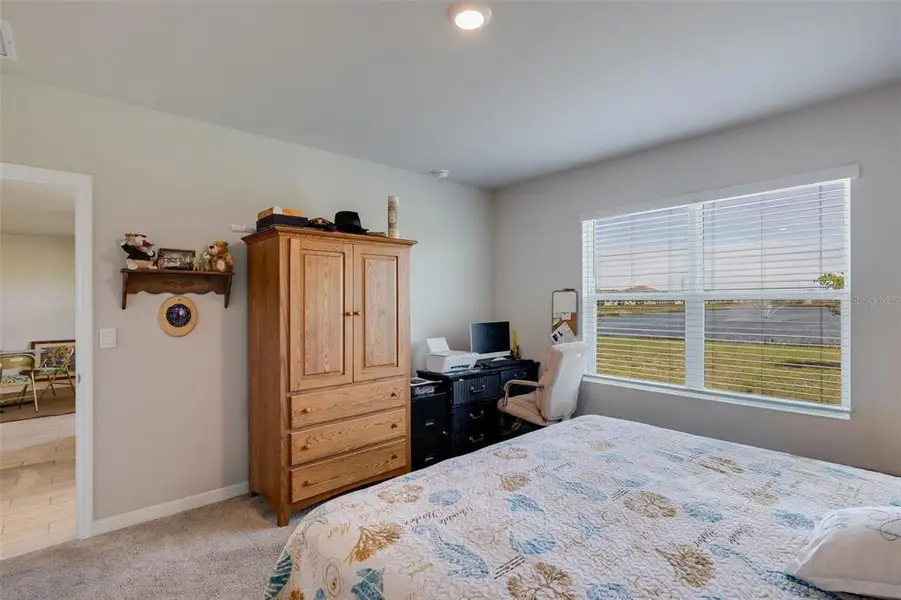 Furnished interior view inside a new home in Coral Bay - Express & Tradition, North Fort Myers (Image 10).