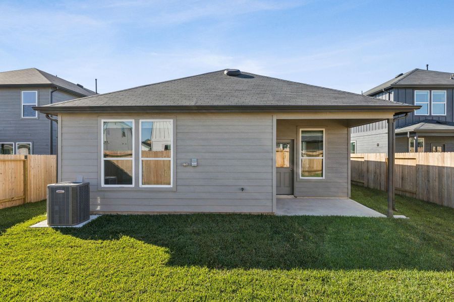 Exterior details and patio area of a home in Montgomery Bend, Montgomery (Image 4).