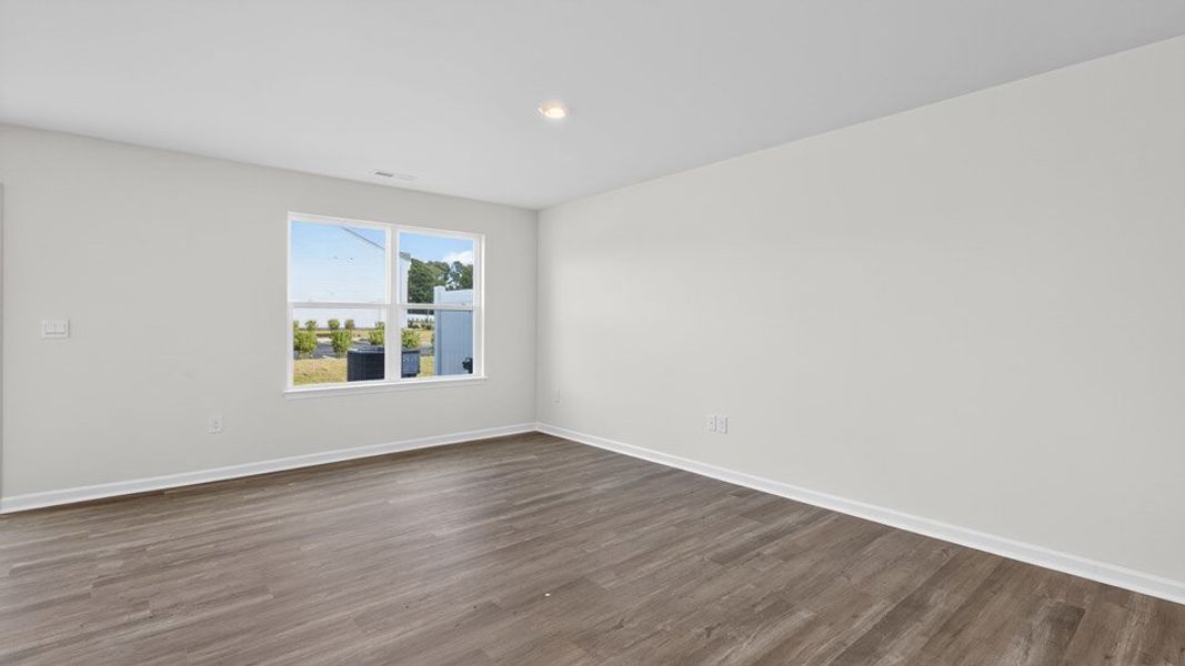 Spacious, unfurnished interior of a new home in The Townes at Honeycutt Oaks, Angier (Image 19).