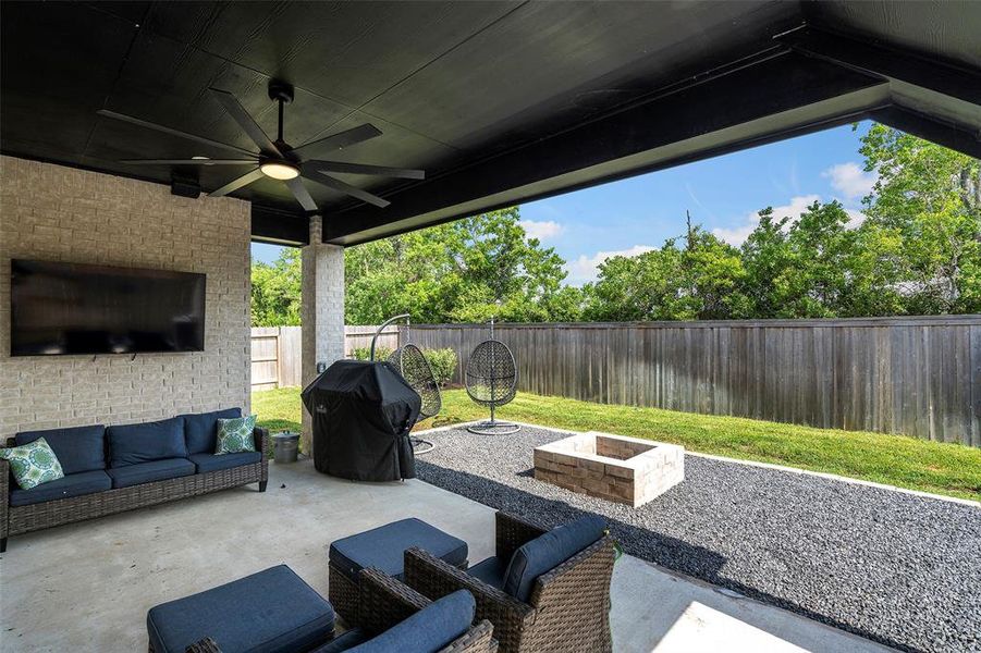 Relax outside under this covered patio