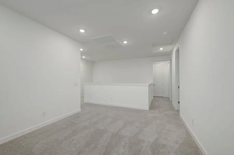 Spacious, unfurnished interior of a new home in Soleo, San Tan Valley (Image 25).