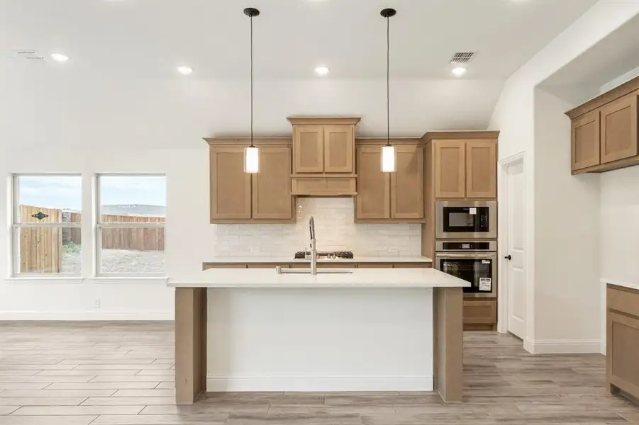 Furnished interior view inside a new home in Grand Heritage, Lavon (Image 14). Furnished interior view inside a new home in Grand Heritage, Lavon (Image 14).
