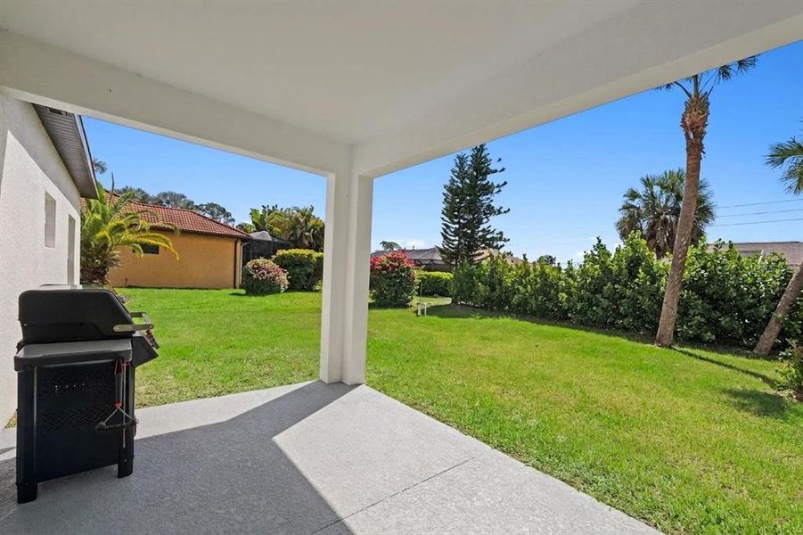 Exterior details and patio area of a home in , North Port (Image 22).