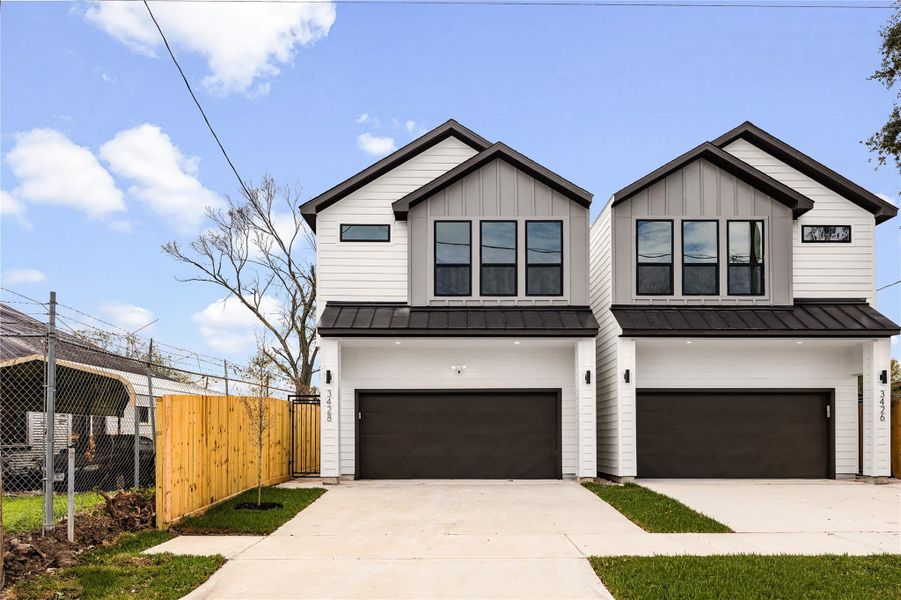 These modern new-build homes offer striking curb appeal with clean architectural lines and a sleek, contemporary design. The wide driveway and private fencing create a welcoming first impression with added privacy.