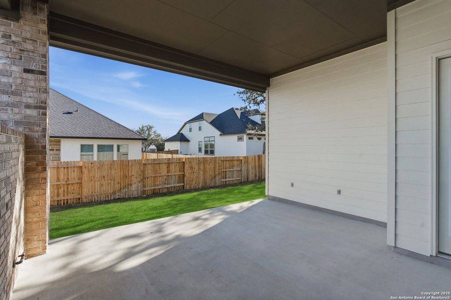 Exterior details and patio area of a home in Mesa Western, Cibolo (Image 25).