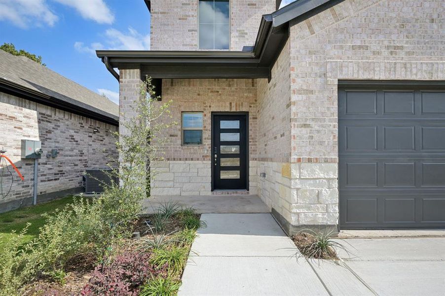 Exterior details and patio area of a home in Eastridge - Spring Series, McKinney (Image 3). Exterior details and patio area of a home in Eastridge - Spring Series, McKinney (Image 3).