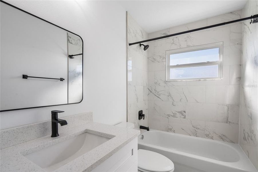 GUEST BATHROOM WITH SHOWER TUB