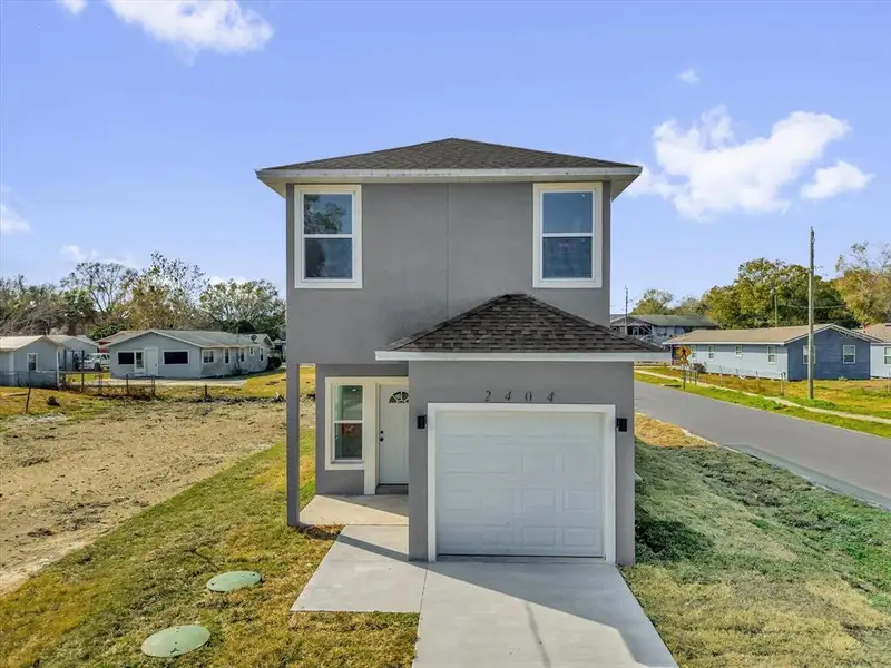 Front exterior of a new home in , Sanford, FL, highlighting curb appeal (Image 1). Front exterior of a new home in , Sanford, FL, highlighting curb appeal (Image 1).