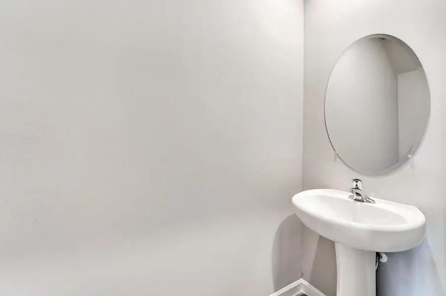 Guest half bathroom downstairs Guest half bathroom downstairs