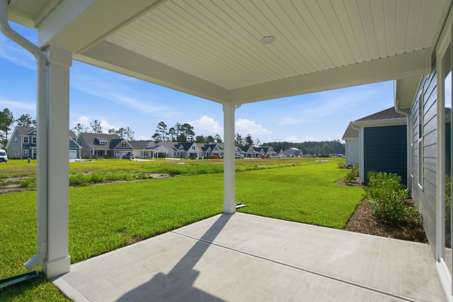 Exterior details and patio area of a home in Terrapin, Leland (Image 15). Exterior details and patio area of a home in Terrapin, Leland (Image 15).