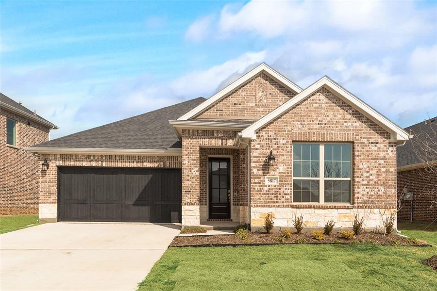 Front exterior of a new home in Sutton Fields, Celina, TX, highlighting curb appeal (Image 17).