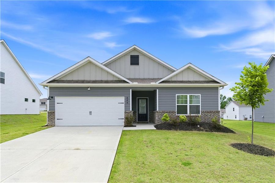 Front exterior of a new home in Lake Preserve at Jackson Trail, Jefferson, GA, highlighting curb appeal (Image 1). Front exterior of a new home in Lake Preserve at Jackson Trail, Jefferson, GA, highlighting curb appeal (Image 1).