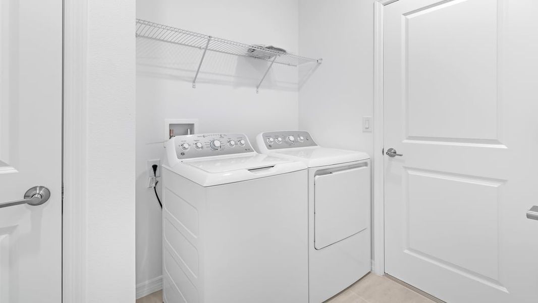 Representative furnished interior of a home built from the Ambrosia by Taylor Morrison in Aden South at Westview, Kissimmee (Image 7).