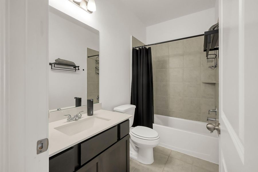 Furnished interior view inside a new home in Lexington Heights, Willis (Image 12).