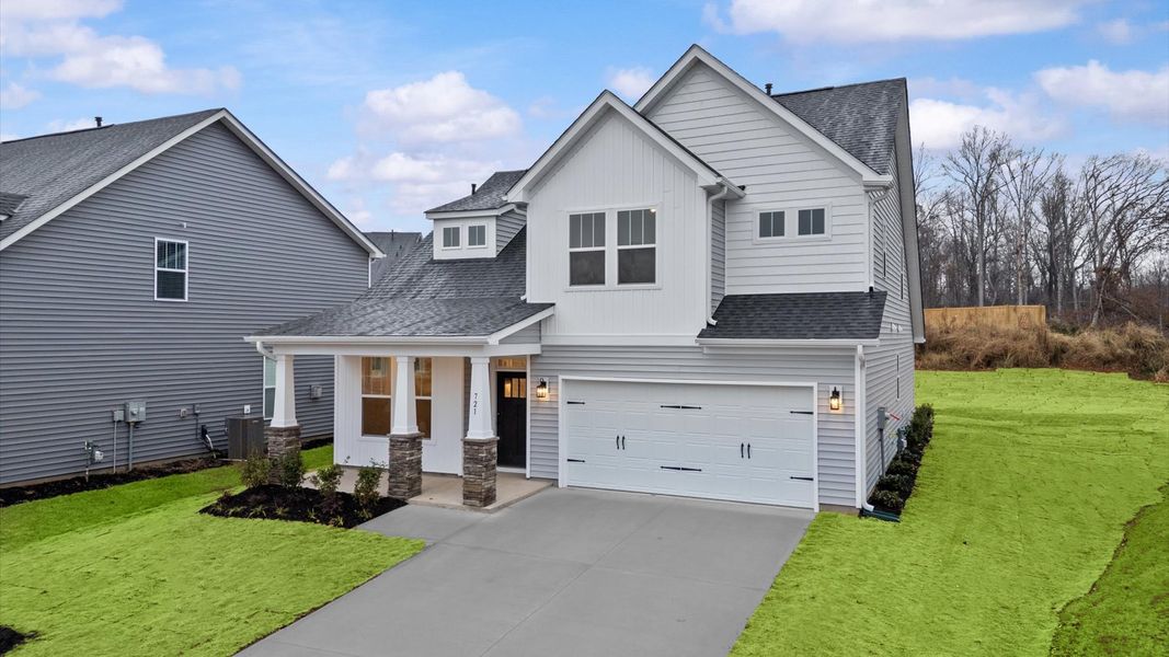 Front exterior of a new home in Fox Hollow, Spartanburg, SC, highlighting curb appeal (Image 2). Front exterior of a new home in Fox Hollow, Spartanburg, SC, highlighting curb appeal (Image 2).
