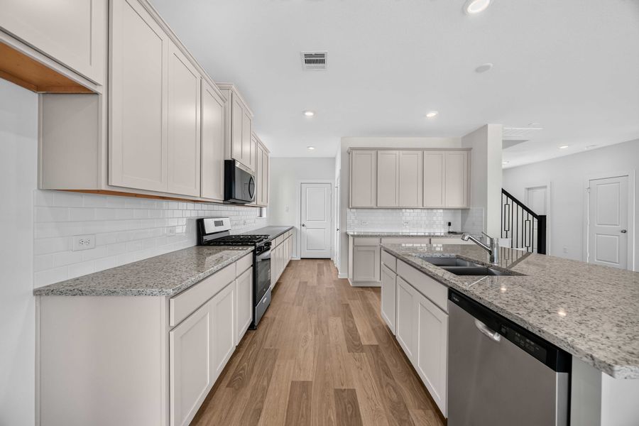 Furnished interior view inside a new home in La Segarra 40', Brookshire (Image 8).