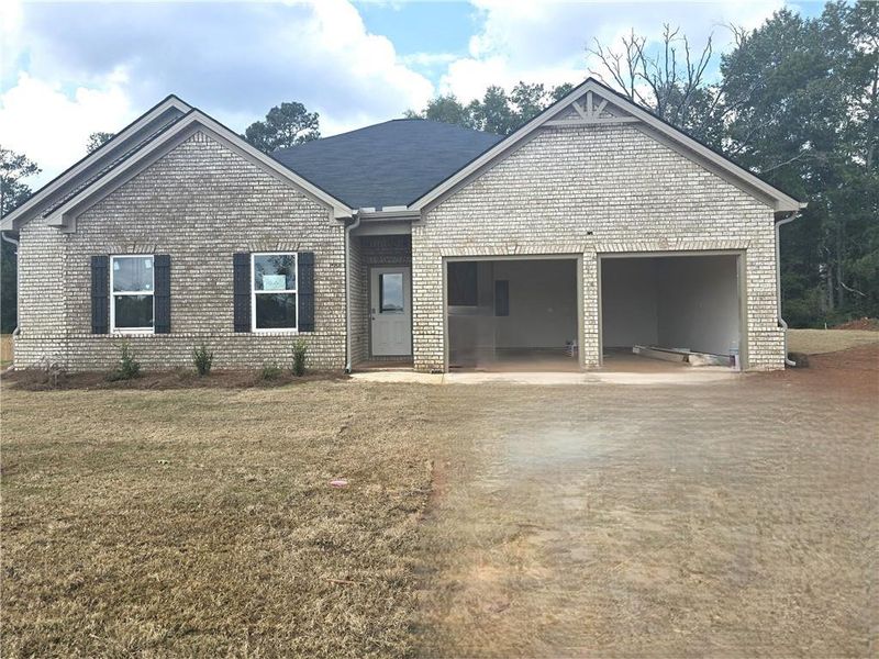 Front exterior of a new home in Southern Hills, McDonough, GA, highlighting curb appeal (Image 2).