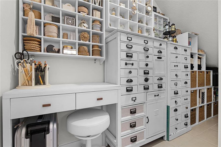 Under the stair storage being used as a crafting closet Under the stair storage being used as a crafting closet